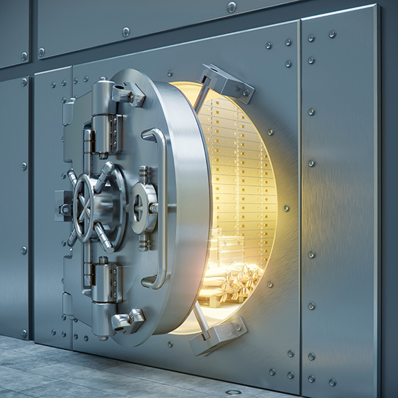 A large bank vault door is slightly open showing money inside